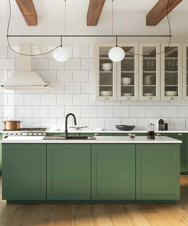Stylish kitchen with green cabinets, white tile backsplash, glass-door cupboards, wooden beams, and pendant lights. Modern and elegant ambiance.